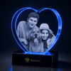 Heart-shaped 3D crystal keepsake displaying a couple's photo for a 50th anniversary gift for her