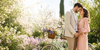 Personalized 1st anniversary photo crystal with a couple in a spring garden