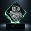 Square 3D crystal keepsake displaying a couple's photo for a 25th anniversary gift for her