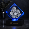 Memirova Memory Crystal Square Keepsake - personalized laser-engraved optical crystal keepsake for a pet, family, or couple, shown from the front on its display base 