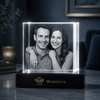 Memirova Faceted Crystal Memorial Keepsake, shown illuminated on an optional LED light display base
