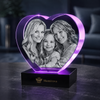 Memirova Memory Crystal Heart Keepsake, shown illuminated on an optional LED light display base