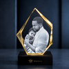 Memirova Faceted Prestige Crystal Memorial Keepsake, shown illuminated on an optional LED light display base
