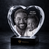 Memirova Faceted Heart Crystal Memorial Keepsake, displayed on a shelf as part of a home memorial display