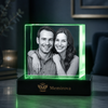 Memirova Faceted Crystal Memorial Keepsake, displayed on a shelf as part of a home memorial display