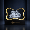 Memirova Faceted Bone Crystal Memorial Keepsake, displayed on a shelf as part of a home memorial display
