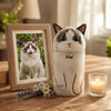 Memirova Cat Memorial Urn, shown from a side angle, highlighting the curve of the ceramic body and glaze